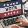Man doing online voting on laptop showing the security flaws in U.S. online voting system that raised alarm over potential vote manipulation