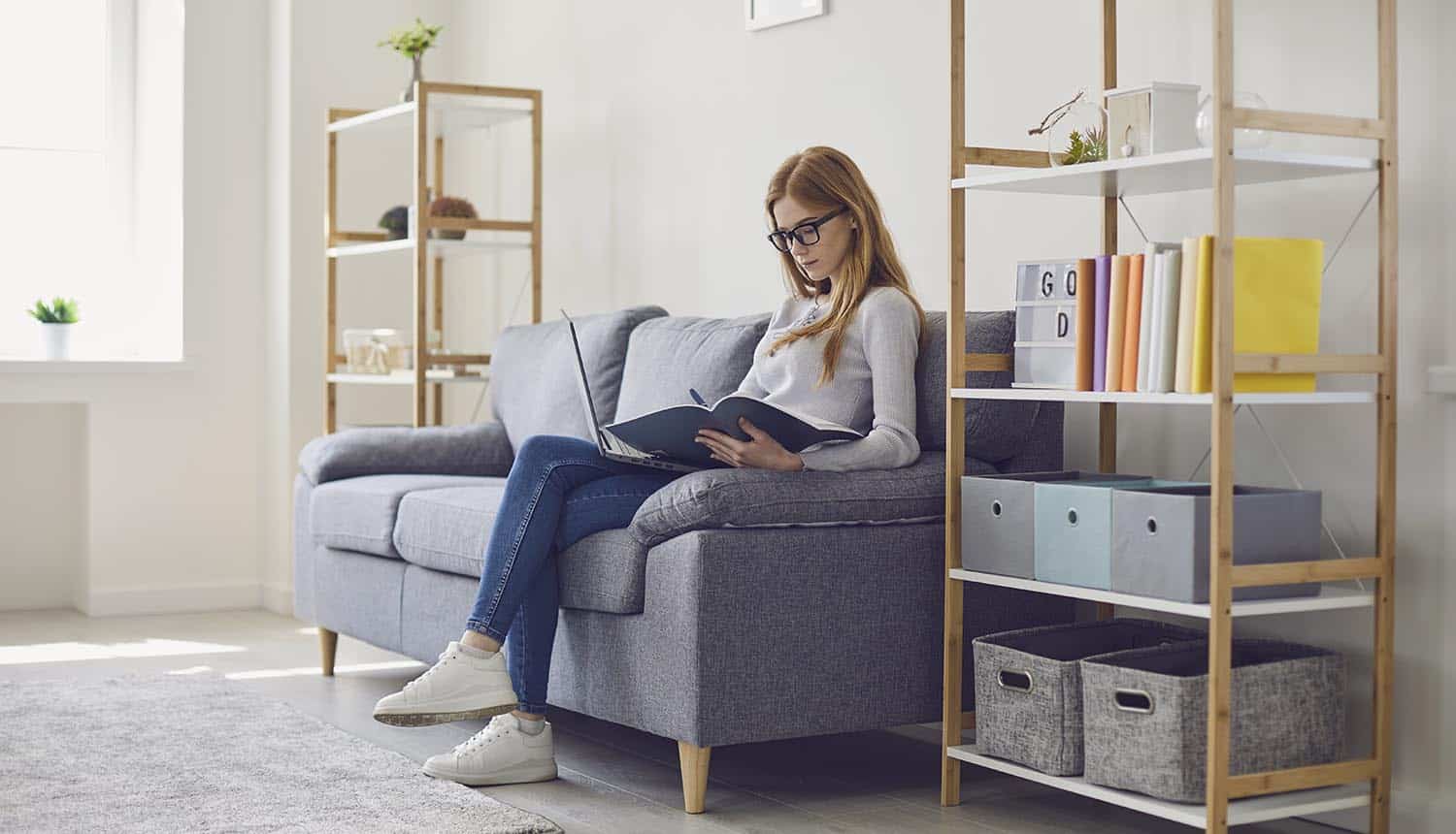 Serious young woman doing online training for cyber security literacy