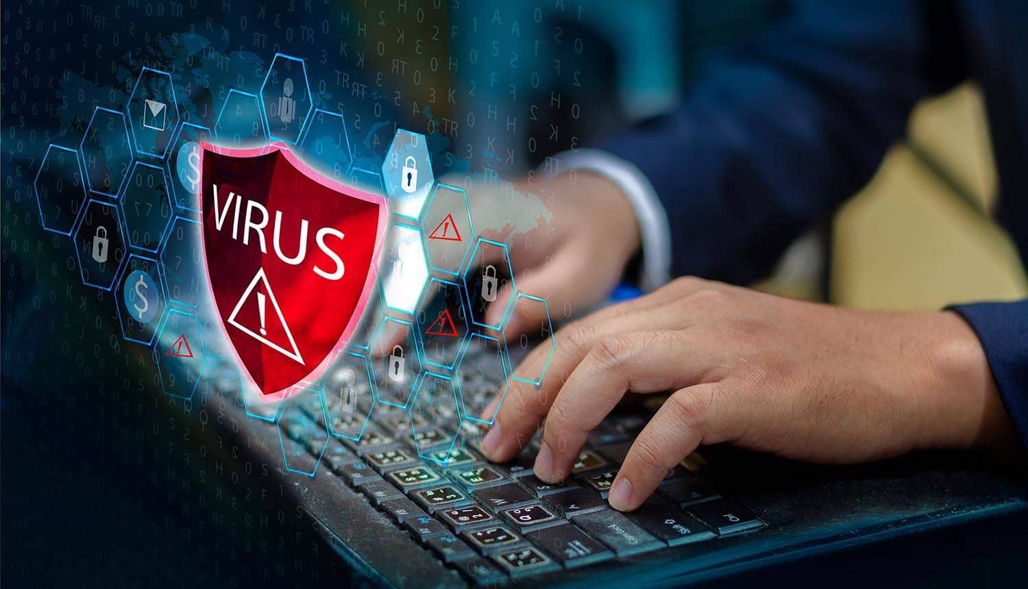 Man working on computer with protective shield showing antivirus is not enough