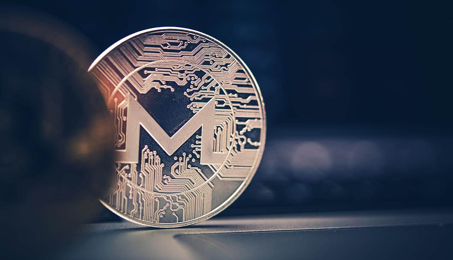 Close up Monero cryptocurrency coin showing tracking of cryptocurrency transactions