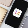 iPhone with iOS 14 logo on the screen showing new user consent requirements' impact on online ads