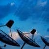 Satellite dish sending data showing cyber attacks for telecom industry