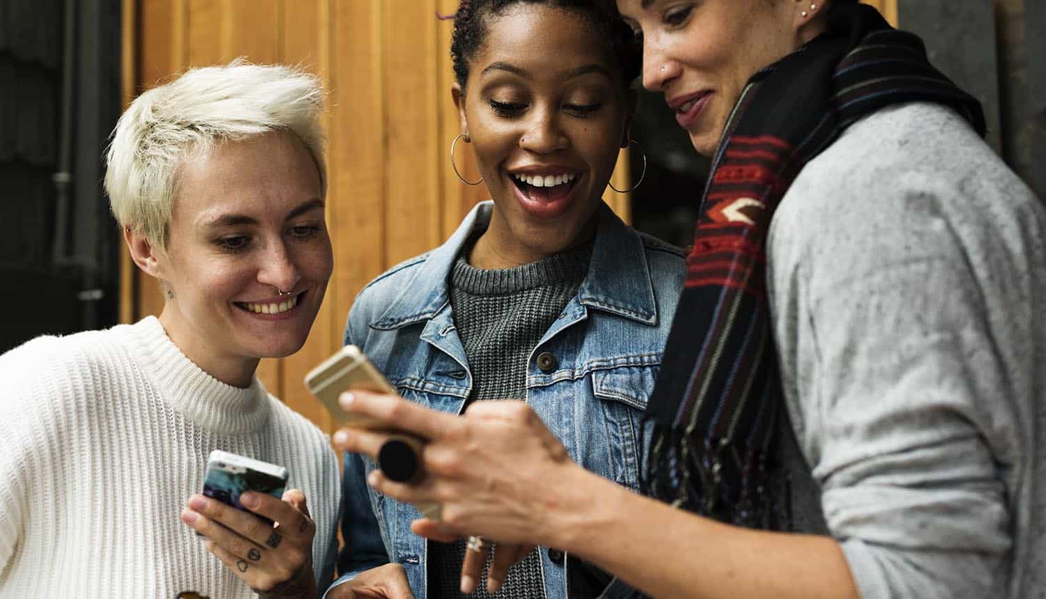 Women using mobile phone for online shopping