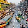 Pedestrians cross the road in India showing impact of data breach on payment processor