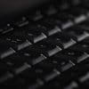Close-up of a black keyboard showing Chinese hackers SolarWinds hack