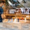 View from the street of Apple Genius employee looking at iPhones showing policy on biometric data for Apple employees