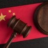 Judge gavel on the China flag showing data protection law impacting tech firms