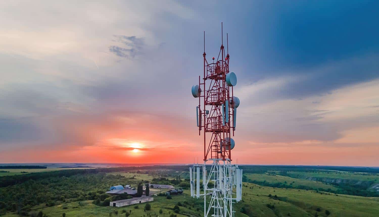 Telecommunication antenna receiver on cell phone tower with 5G showing challenge of legacy signalling protocols