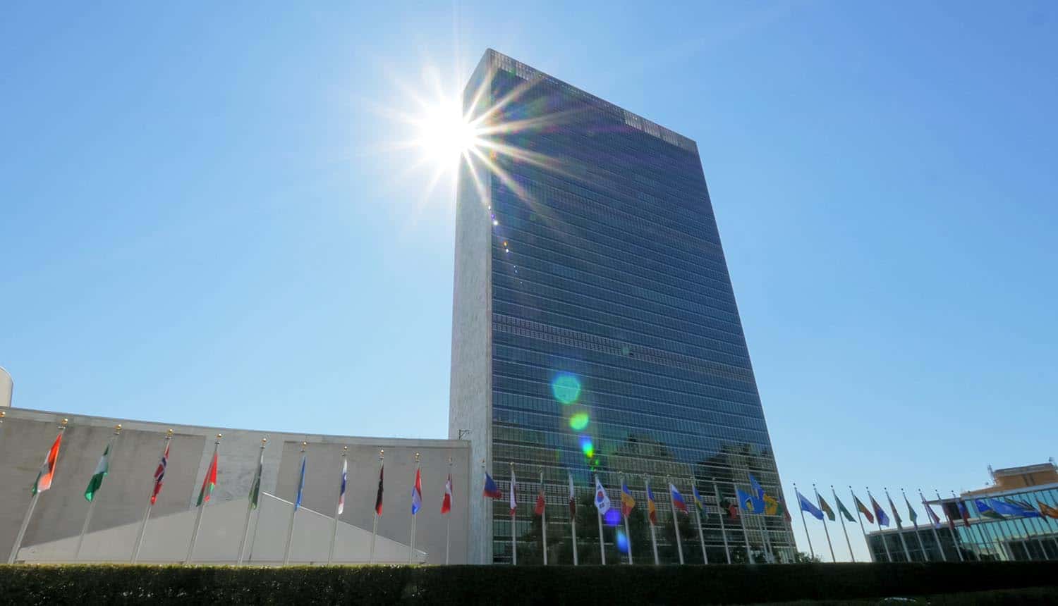 Sun shining behind United Nations building showing data breach