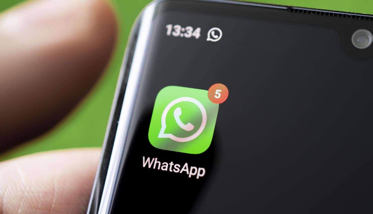 Icon of the WhatsApp app on the screen of a smartphone showing GDPR fine by Irish DPA