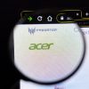 Acer company website page logo on laptop display showing cyber attack by hacking group