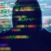 Hidden hacker works in the dark to steal data online showing incident response for data breach