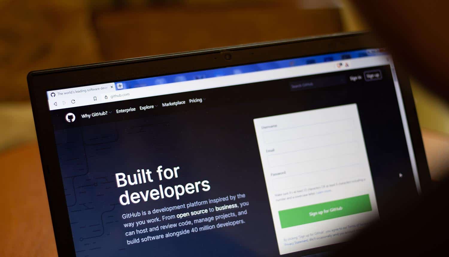 GitHub website on laptop screen showing leak of login cookies