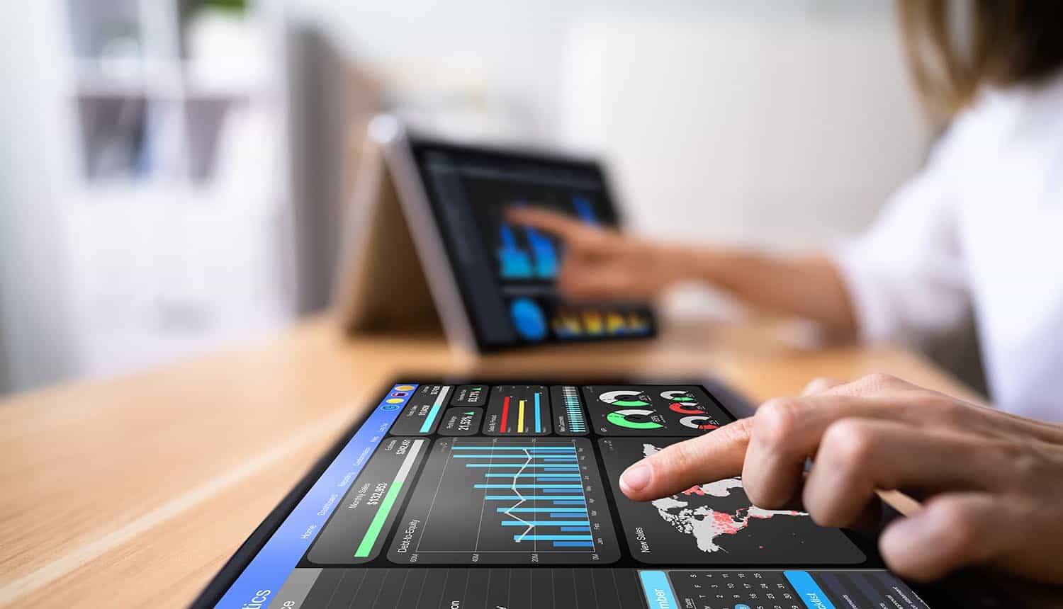 Woman using business dashboard technology for search trends
