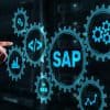 Businessman presses virtual button for SAP security