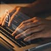 User typing login and password showing identity security and zero trust