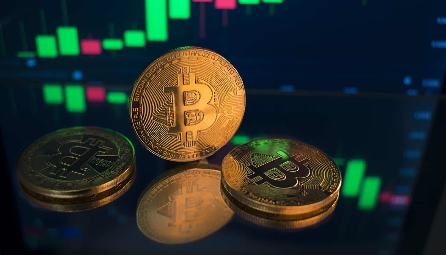 Bitcoin cryptocurrency coins with chart background
