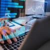 Data analyst using data analytics on laptop