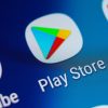 Google Play store application icon on mobile phone screen showing privacy labels for Android apps