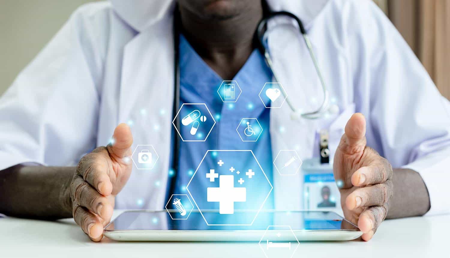 Doctor with medical icons on tablet showing data breach of healthcare provider