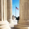 Marble columns of the US Supreme Court showing data breach of federal courts records system