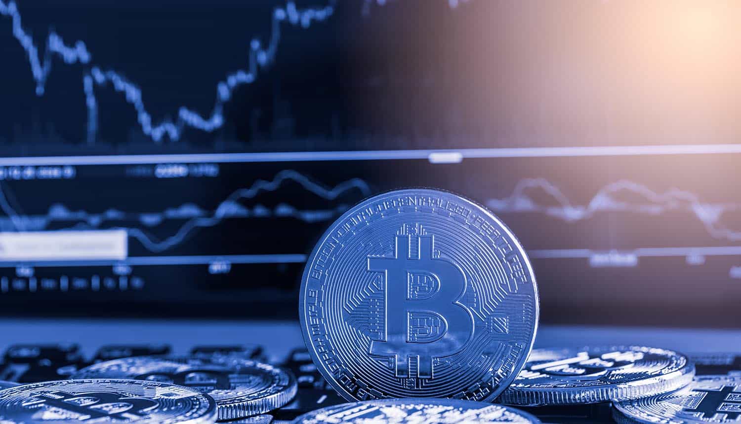 Bitcoin in front of charts