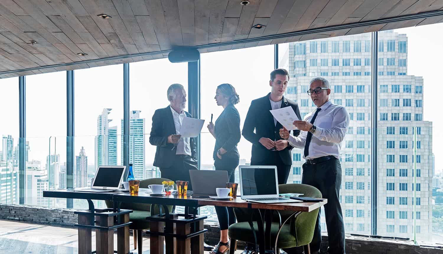 Board members discussing in boardroom about cyber attack preparedness