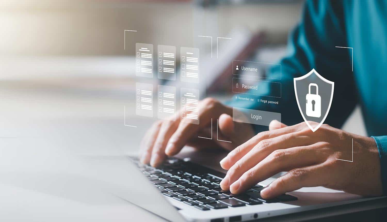 Man typing on keyboard with with padlock icon on the virtual interface