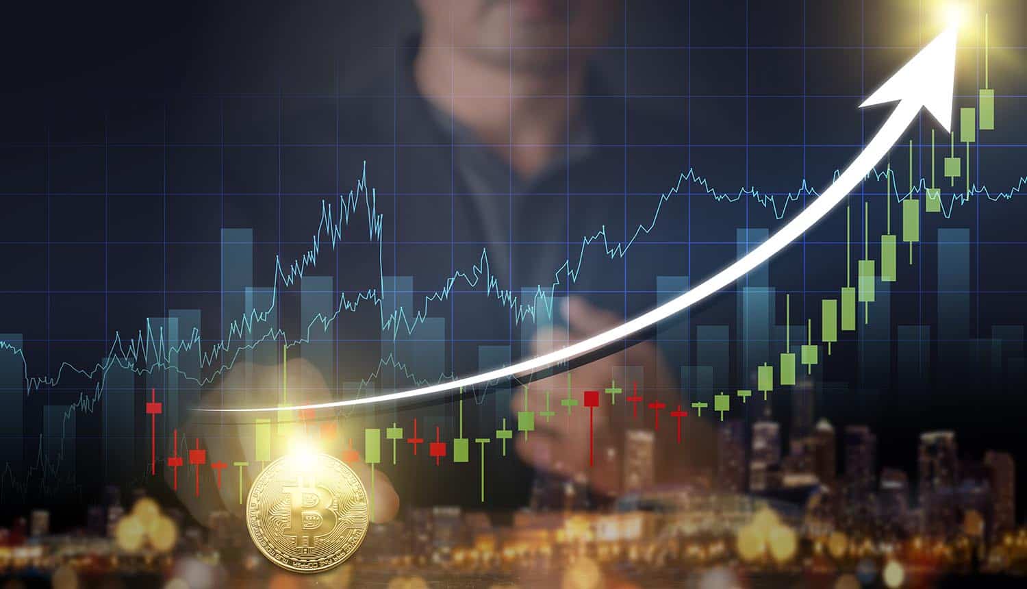 Hands of businessman with gold bitcoin coin