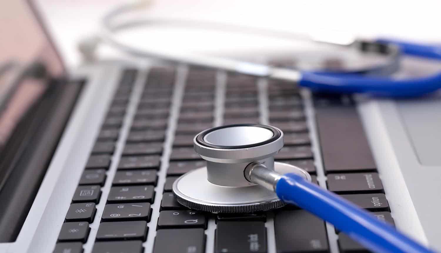 Stethoscope on laptop