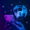 Hacker using mobile phone showing data breach and SMS phishing