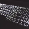 White light on keyboard showing insurance company security breach