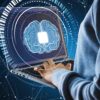 Hacker hands using laptop with virtual brain showing OpenAI tools used by state-sponsored hacking groups
