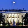 The White House at night showing cybersecurity budget