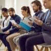 People waiting for job interview showing cyber security workforce recruitment