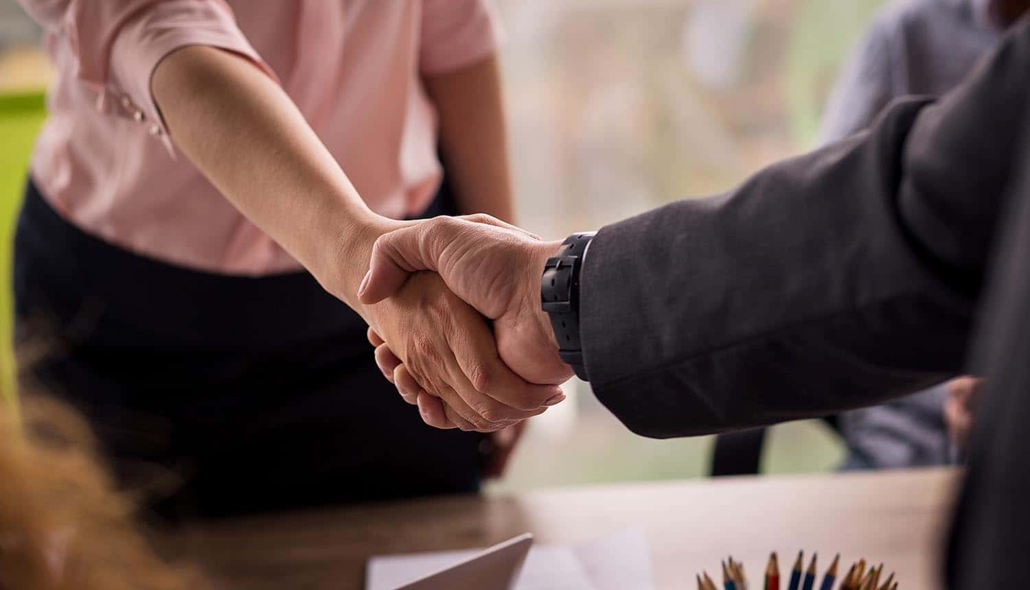 Shaking hands on business deal