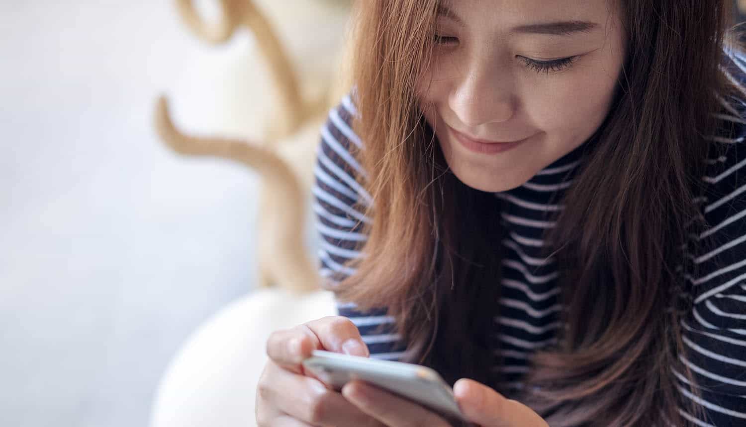 Woman using smart phone
