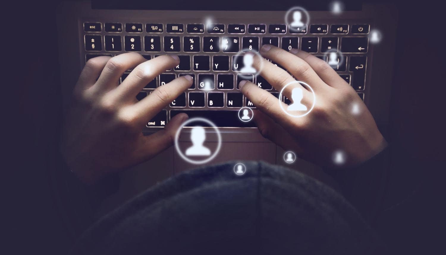 Hands on keyboard and person icon showing stolen credentials from Git config files