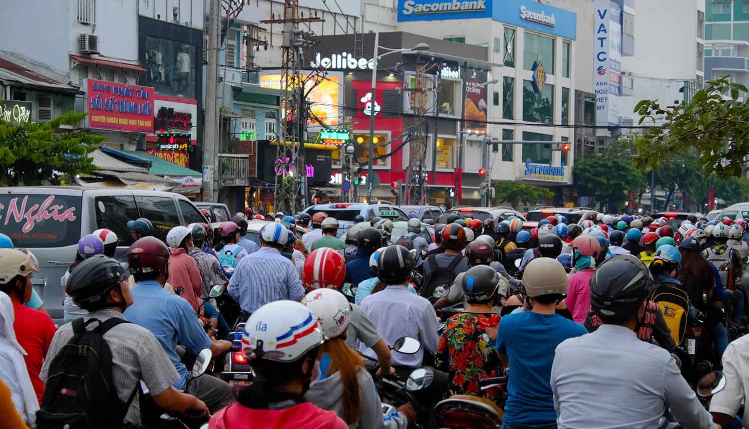 Crowded scene at Vietnam city in rush hour showing tech companies and data protection law