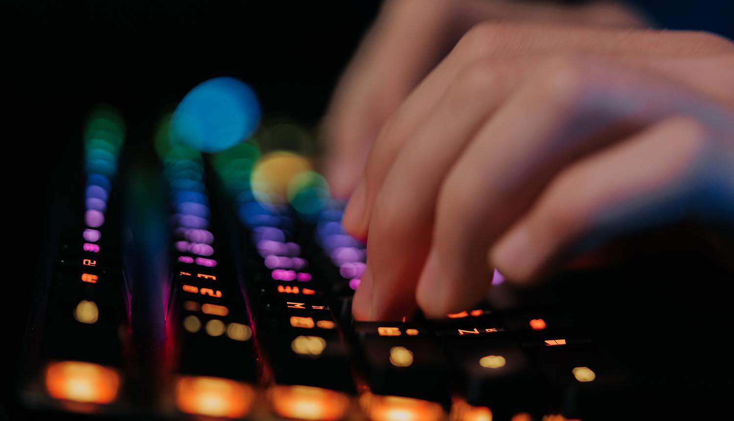 Hacker hands on keyboard showing cyber attack on online ordering systems