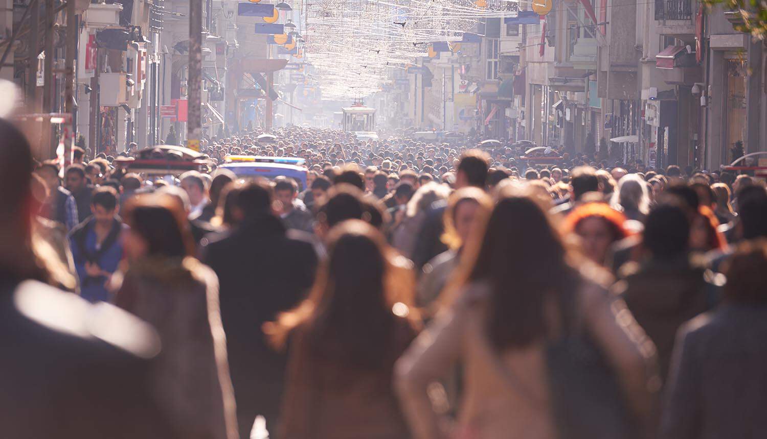Crowd walking on busy street showing UnitedHealth data breach