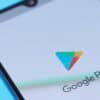 Google Play Store logo on screen showing malicious apps and ad fraud
