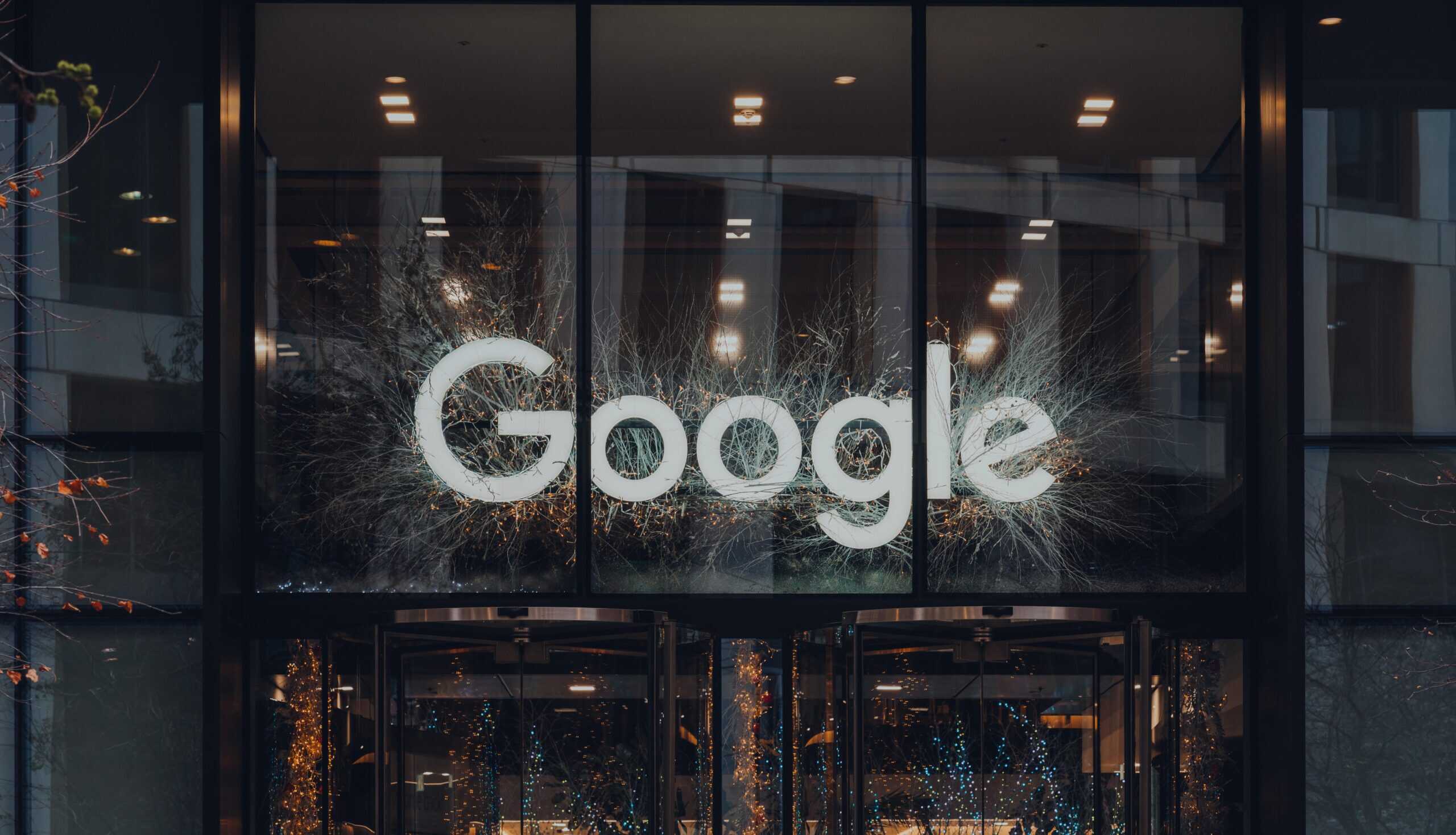 Google sign above entrance showing consumer privacy settlement in Texas