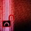 Unlocked digital lock showing cyber attack impacting insurance claims documents