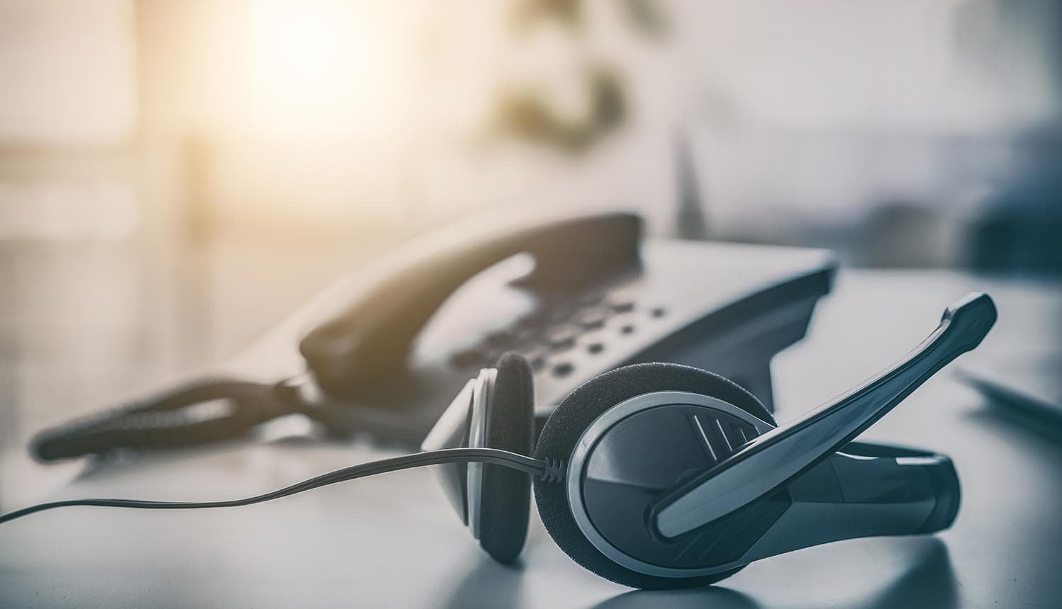 Headset on table showing IT help desk in cyber attack