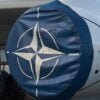 Plane with NATO logo showing ICC cyber attack