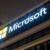 Microsoft logo on building showing Sharepoint zero-day vulnerability