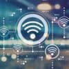 Wifi icons against city background showing wireless threats on critical infrastructure