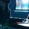 Hacker with laptop showing insider data breach