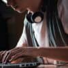 Student working on laptop showing data breaches in schools